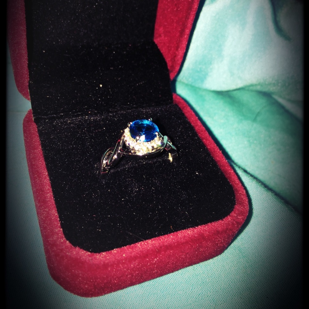 Blue emerald and diamond ring